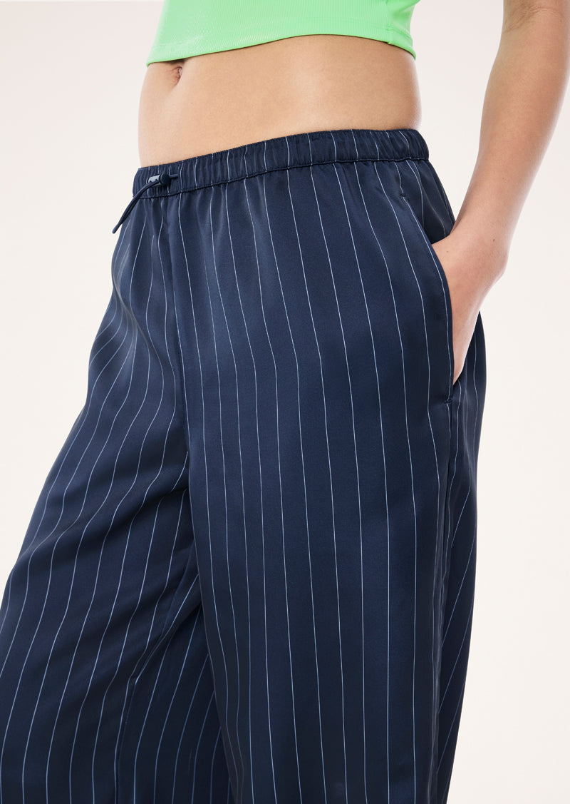P.E Nation Balance Satin Pant in Dark Navy Pinstripe