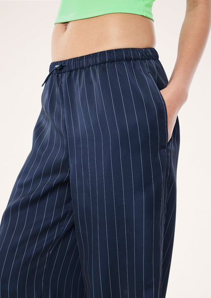 P.E Nation Balance Satin Pant in Dark Navy Pinstripe