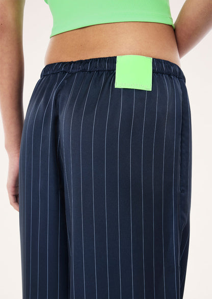 P.E Nation Balance Satin Pant in Dark Navy Pinstripe