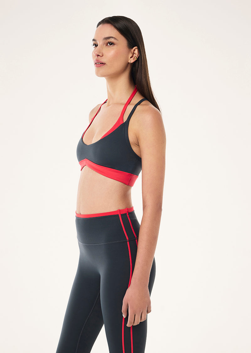 P.E Nation Override Sports Bra in Asphalt/Strawberry Red