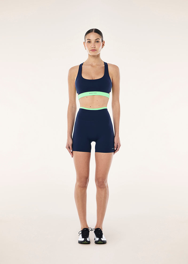 P.E Nation Stellar 5" Bike Short in Dark Navy/Kiwi Green
