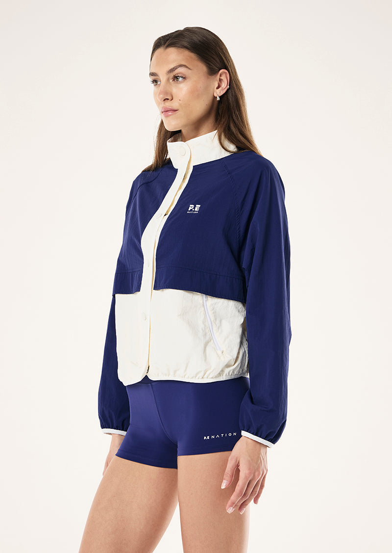 P.E Nation Technique Spray Jacket in Bright Navy